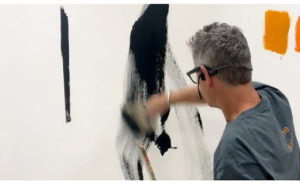 Nicholas Wilton doing a demo with black paint
