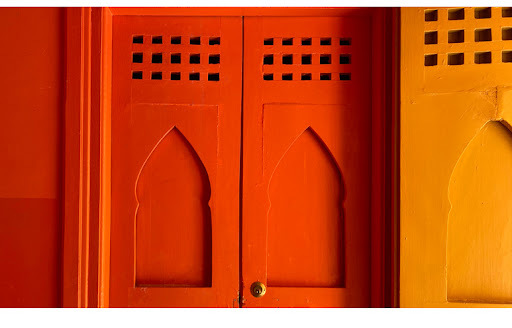 red and orange doors with design