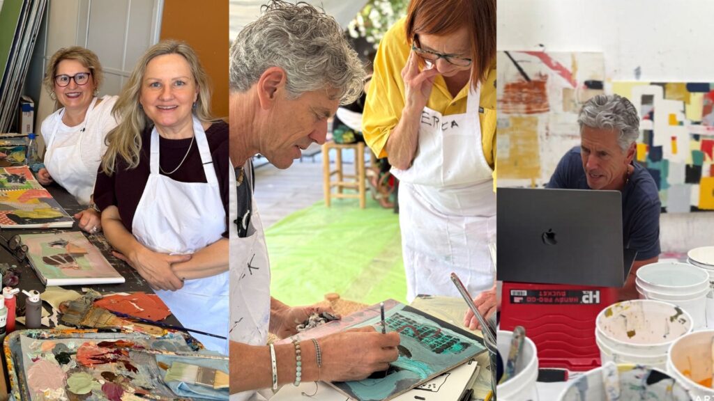 Four artists painting in a bright studio, with paint-splattered tables and colorful supplies nearby.