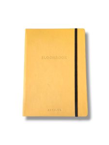 Yellow hardcover notebook with a black elastic strap running along the right edge, embossed with BLOOMBOOK on the cover.